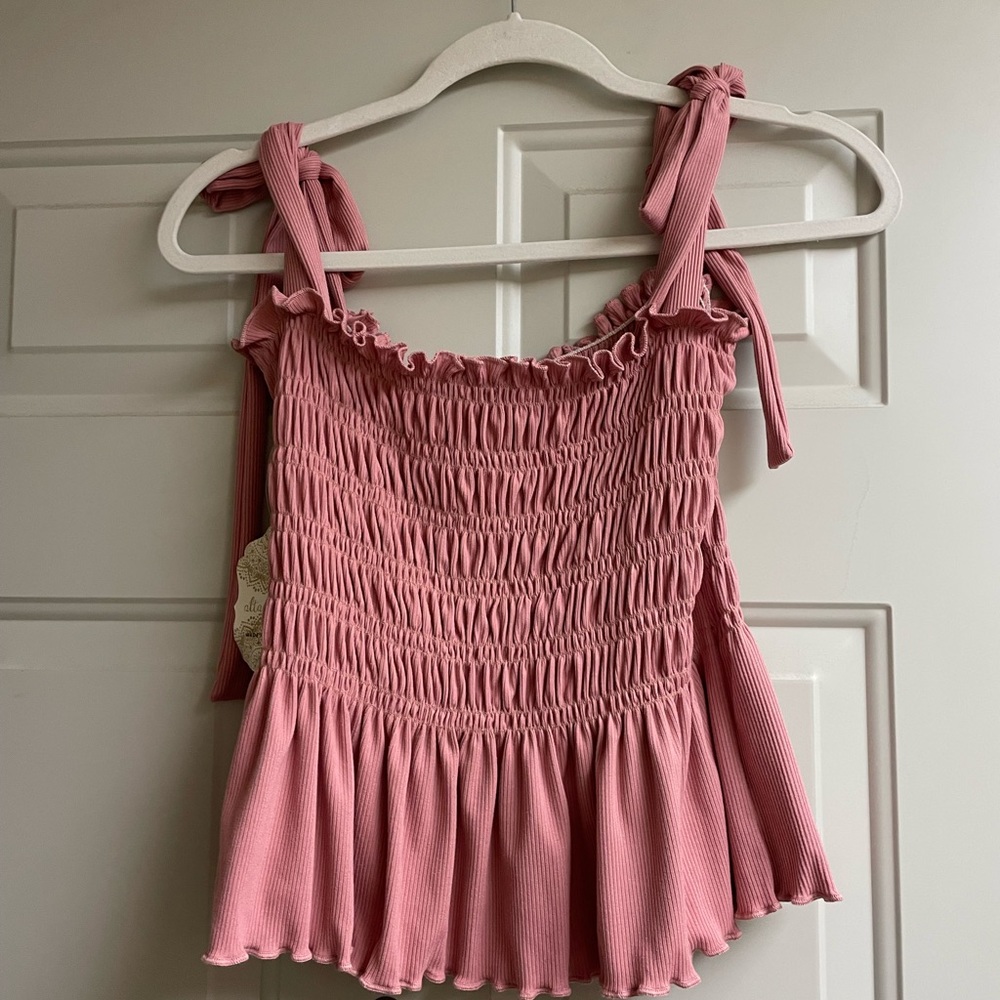 Pink tank top tie strap
